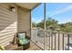 Screened balcony with seating at 850 S Tamiami Trl # 624, Sarasota, FL 34236