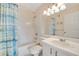 Bright bathroom features a shower and tub combination, white vanity, and a neutral color scheme at 850 S Tamiami Trl # 624, Sarasota, FL 34236