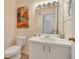 Bathroom with vanity, toilet, and decorative accents creates a pleasant and functional space at 850 S Tamiami Trl # 624, Sarasota, FL 34236