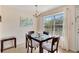 Cozy dining room with natural light and seating for four at 850 S Tamiami Trl # 624, Sarasota, FL 34236