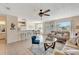 Open living space featuring coastal decor, comfortable seating, and dining area at 850 S Tamiami Trl # 624, Sarasota, FL 34236