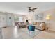 Inviting living room with coastal decor and access to balcony at 850 S Tamiami Trl # 624, Sarasota, FL 34236