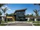 Modern clubhouse with large glass windows, showcasing architectural design and community space at 8579 Big Dipper Dr, Sarasota, FL 34241