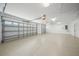 Garage features a light, epoxy floor and two-car garage door at 9106 Yarberry St, Sarasota, FL 34240