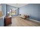 Cozy living room with large window and charming furnishings, bathed in natural light at 9106 Yarberry St, Sarasota, FL 34240