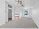 Bright and airy main bedroom featuring plush carpeting, ceiling fans, and multiple entryways at 9315 9Th Nw Ave, Bradenton, FL 34209
