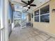 Spacious patio featuring a spiral staircase and a ceiling fan at 9315 9Th Nw Ave, Bradenton, FL 34209