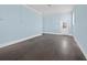 Spacious room with lots of wall space and a door to the outside at 9315 9Th Nw Ave, Bradenton, FL 34209