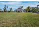 Lush yard with pool and house in background at 9315 9Th Nw Ave, Bradenton, FL 34209