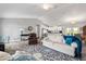 Spacious open-concept living room with vaulted ceilings, neutral walls, and wood-look tile flooring at 9601 Calumet Blvd, Port Charlotte, FL 33981