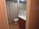 Bathroom with neutral fixtures at 9835 El Camino Real Ave, Port Richey, FL 34668