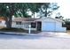 Well-maintained single-Gathering home featuring an attached garage at 9835 El Camino Real Ave, Port Richey, FL 34668