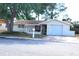 Well-maintained single-Gathering home featuring an attached garage at 9835 El Camino Real Ave, Port Richey, FL 34668