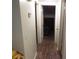 Hallway with doors leading to rooms at 9835 El Camino Real Ave, Port Richey, FL 34668