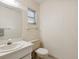 Standard bathroom featuring a mirror and a single sink with light-colored countertop at 1014 Contento St, Sarasota, FL 34242