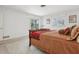 Bedroom view with carpet floors and access to the pool area at 1014 Contento St, Sarasota, FL 34242