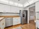 Spacious kitchen with stainless steel appliances and ample storage at 1014 Contento St, Sarasota, FL 34242