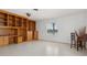 Bright office space with built-in wooden shelving, a window and vintage style desk at 1014 Contento St, Sarasota, FL 34242
