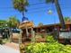 Charming restaurant with nautical decor, wooden accents, and lush landscaping, inviting patrons to enjoy a seaside dining experience at 1014 Contento St, Sarasota, FL 34242