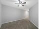 Bedroom with neutral carpet and ceiling fan at 1033 Grantham Dr, Sarasota, FL 34234