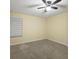 Bedroom with neutral carpet and ceiling fan at 1033 Grantham Dr, Sarasota, FL 34234