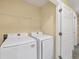 Laundry room with white washer and dryer at 1033 Grantham Dr, Sarasota, FL 34234