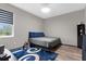 Bedroom featuring gray color scheme, wood-look flooring, and a modern bedframe at 1116 406Th E Ct, Myakka City, FL 34251