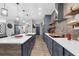 Bright, modern kitchen with stainless steel appliances and a trendy tile backsplash at 1116 406Th E Ct, Myakka City, FL 34251