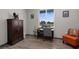 Office room with modern furniture, providing a tranquil space for focused work or study at 1116 406Th E Ct, Myakka City, FL 34251