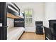 Bedroom featuring a bunk bed, desk, and window, perfect for a room at 11504 Splendid Ln, Tampa, FL 33626