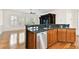 Stylish kitchen with granite countertops, stainless steel dishwasher, and open views to the living area at 11504 Splendid Ln, Tampa, FL 33626