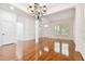 Spacious living room boasts hardwood floors, fresh paint, and recessed lighting, with ample natural light at 11504 Splendid Ln, Tampa, FL 33626