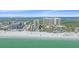 Aerial view of beachfront condos, showcasing ocean views, pools, and easy access to the beach and city at 1212 Benjamin Franklin Dr # 306, Sarasota, FL 34236