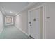 Hallway leading to unit 306 at 1212 Benjamin Franklin Dr # 306, Sarasota, FL 34236