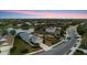 Spacious community featuring homes with lake views, manicured lawns, and convenient street access at 12237 Longview Lake Cir, Bradenton, FL 34211