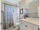 Well-lit bathroom with vanity, framed mirror, and shower-tub combination at 12237 Longview Lake Cir, Bradenton, FL 34211