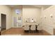 Elegant dining room with modern decor, spacious seating, and ample natural light at 12535 Estrella Blvd, Punta Gorda, FL 33955