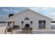 A patio area with a grill and outdoor dining set at 12541 Estrella Blvd, Punta Gorda, FL 33955