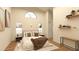 Sunlit bedroom showcases a comfortable bed, modern furnishings, and ample natural light for a relaxing ambiance at 12541 Estrella Blvd, Punta Gorda, FL 33955