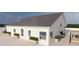 Bright single Gathering home with modern design, stylish planters, and outdoor seating at 12541 Estrella Blvd, Punta Gorda, FL 33955