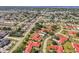 Overhead photograph of idyllic townhomes in a verdant community near local shops and roadways at 1302 58Th W St, Bradenton, FL 34209