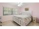 Cozy bedroom with white wood furnishings, natural light and inviting space at 1302 58Th W St, Bradenton, FL 34209
