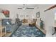 Bright living room featuring coastal decor, comfortable seating, and an open floor plan at 1302 58Th W St, Bradenton, FL 34209