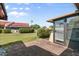 Outdoor patio with access to enclosed sunroom at 1302 58Th W St, Bradenton, FL 34209