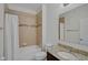 Cozy bathroom with granite countertop, tiled shower, and soaking tub at 15608 31St E St, Parrish, FL 34219
