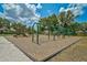 Community playground with swings, slides, and climbing structures, perfect for Gathering fun and outdoor activities at 15608 31St E St, Parrish, FL 34219