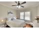 Bright bedroom features two windows and hardwood floors that complement its clean, inviting atmosphere at 1814 6Th W Ave, Bradenton, FL 34205