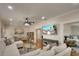 Cozy living room with a large sectional sofa, hardwood floors, and modern decor at 1814 6Th W Ave, Bradenton, FL 34205