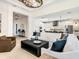 Open concept living room with an eat in kitchen and hardwood floors at 2246 Webber St, Sarasota, FL 34239