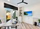 A bright office space with built-in storage, a view of the outdoors, and stylish decor at 2246 Webber St, Sarasota, FL 34239